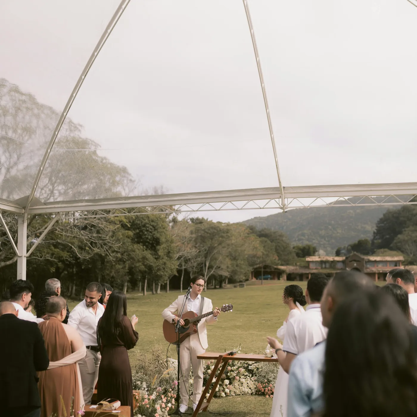 Couple walking in golden hour light at a Tasmanian wedding