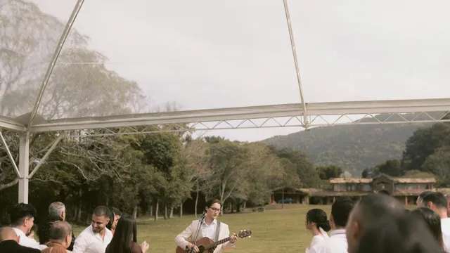 Couple walking in golden hour light at a Tasmanian wedding